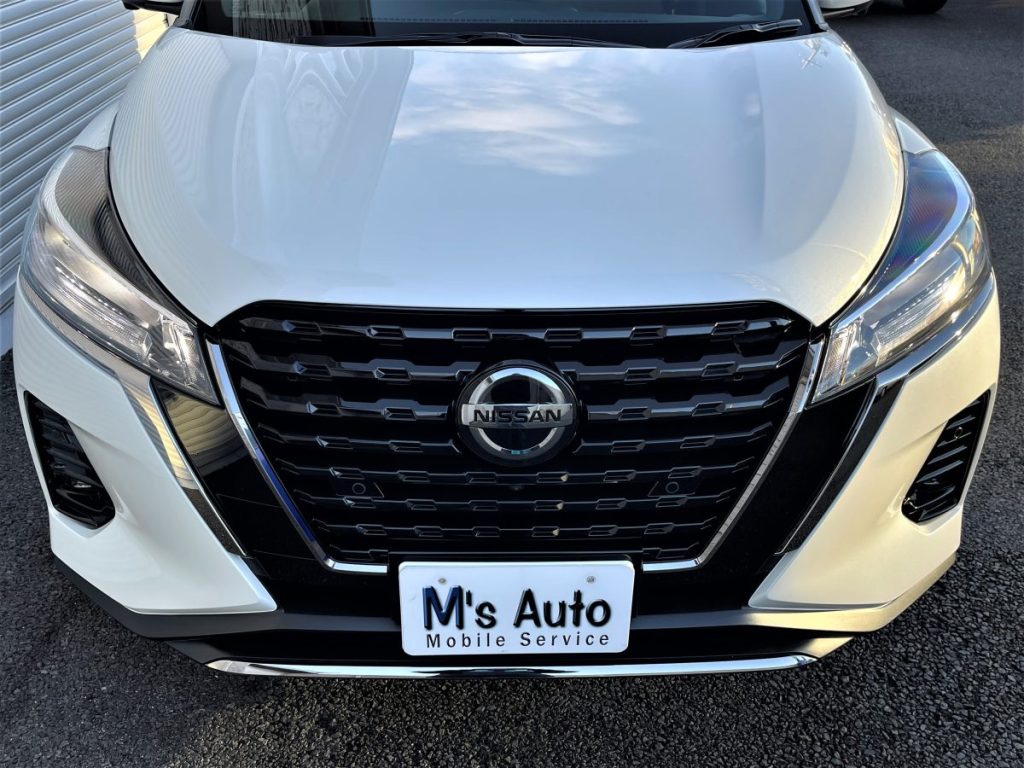 日産キックス Xスタイルエディション パールホワイト車両のフロントバンパーロアフィニッシャー